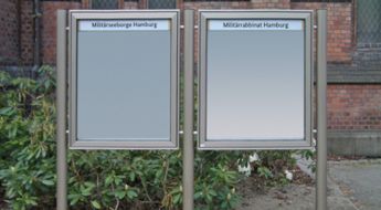 Wandschild am Gebäude 1a Wandschild am Gebäude 1a